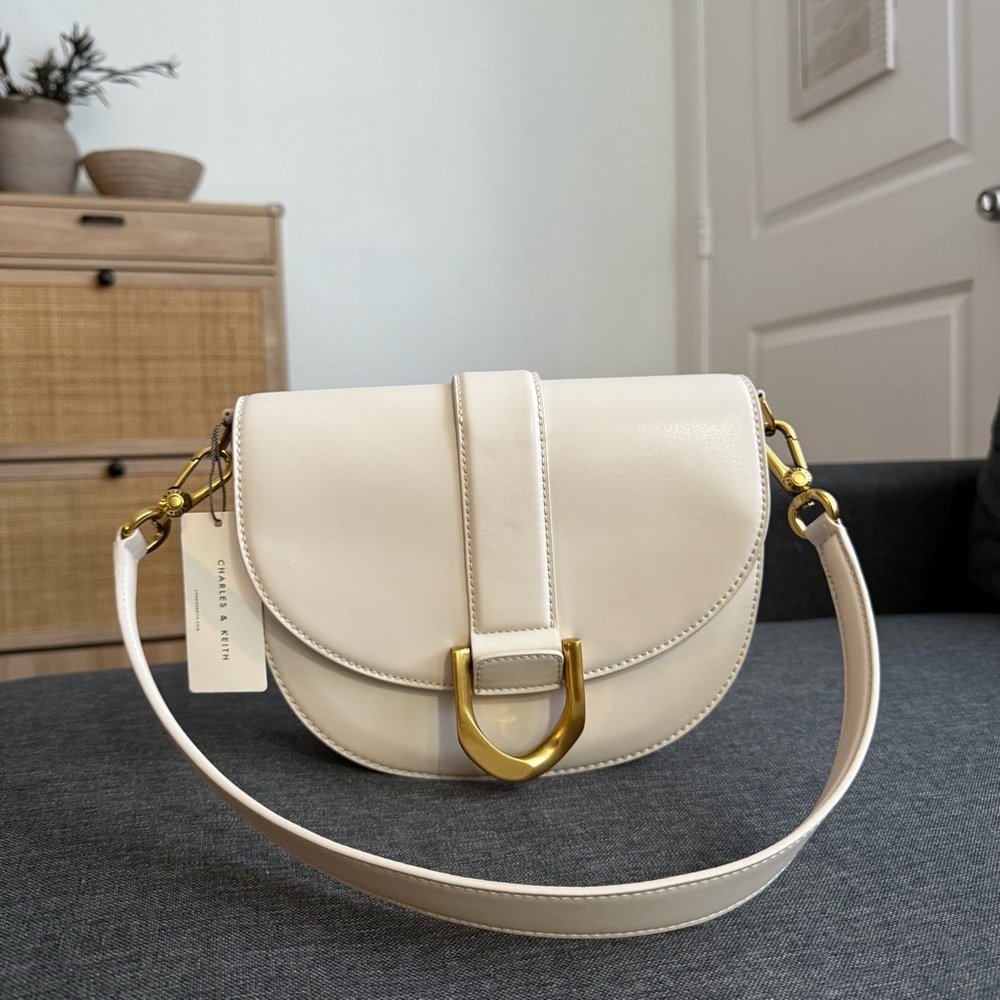 Charles & Keith | Gabine Leather Saddle Bag - Oat | NWT